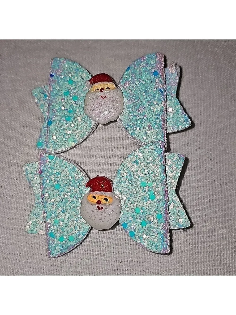Pair of cute santa iridescent hair bows